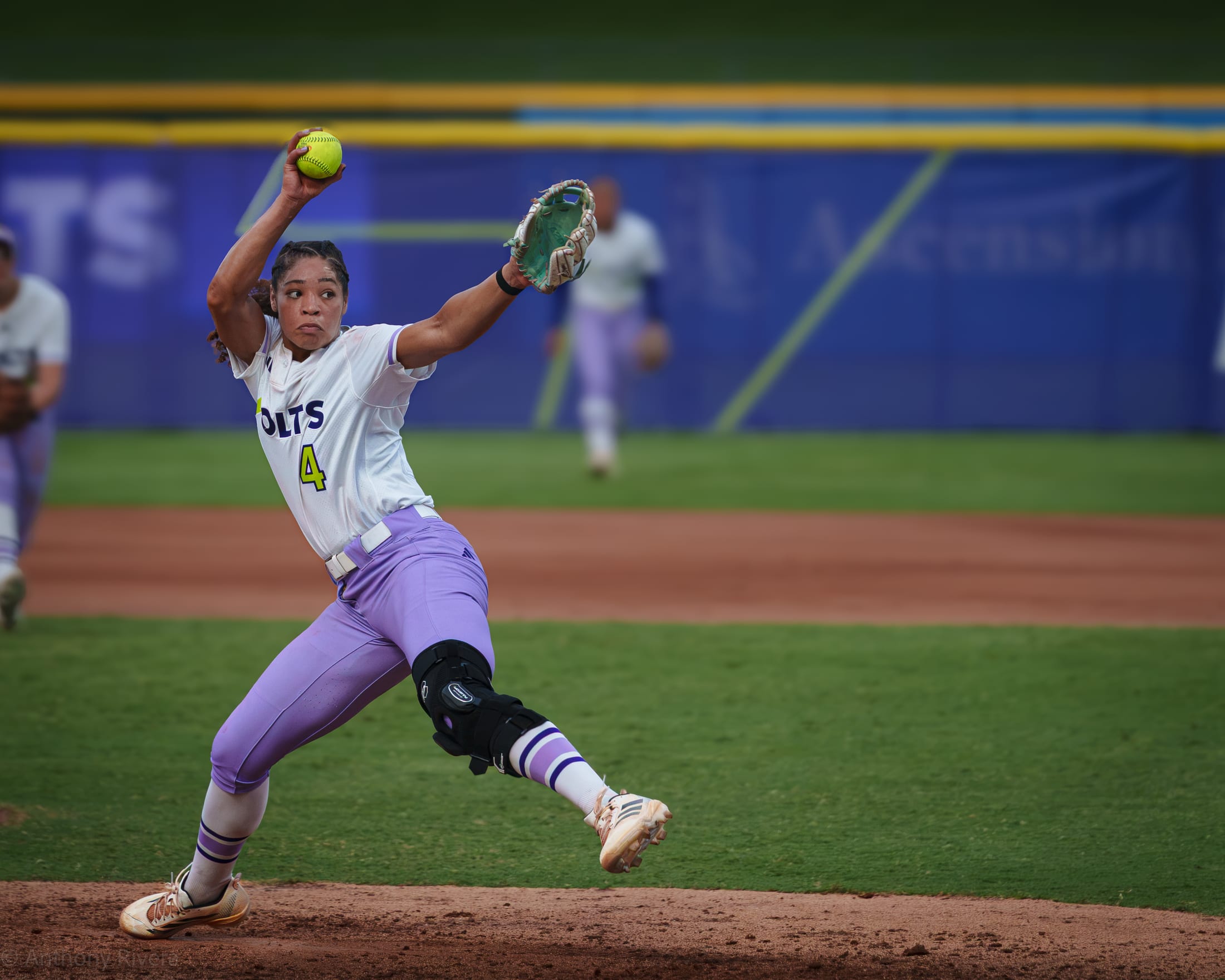 Aliyah Binford pitches in relief at Dell Diamond.