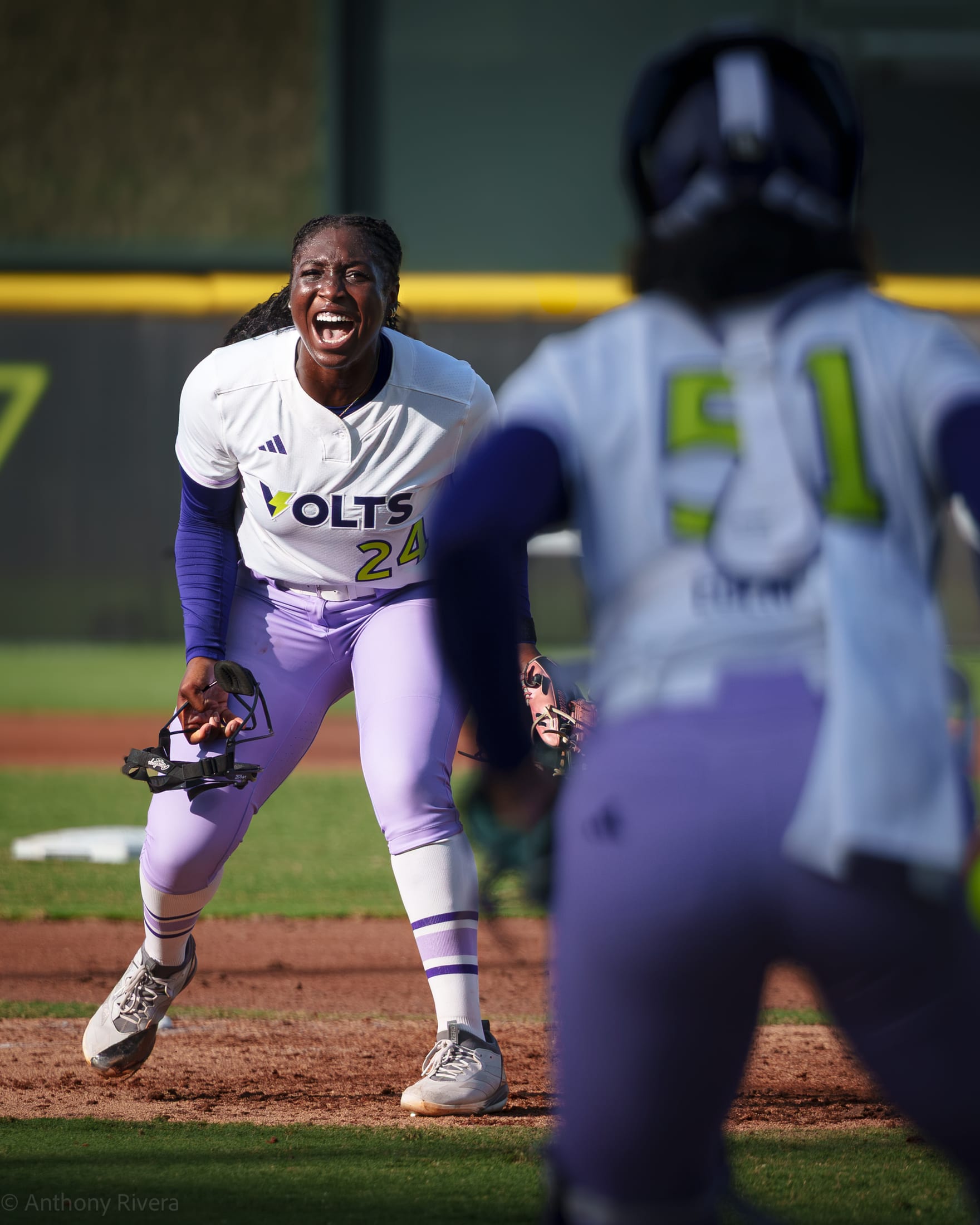 A Texas Volts batter follows through at Dell Diamond.