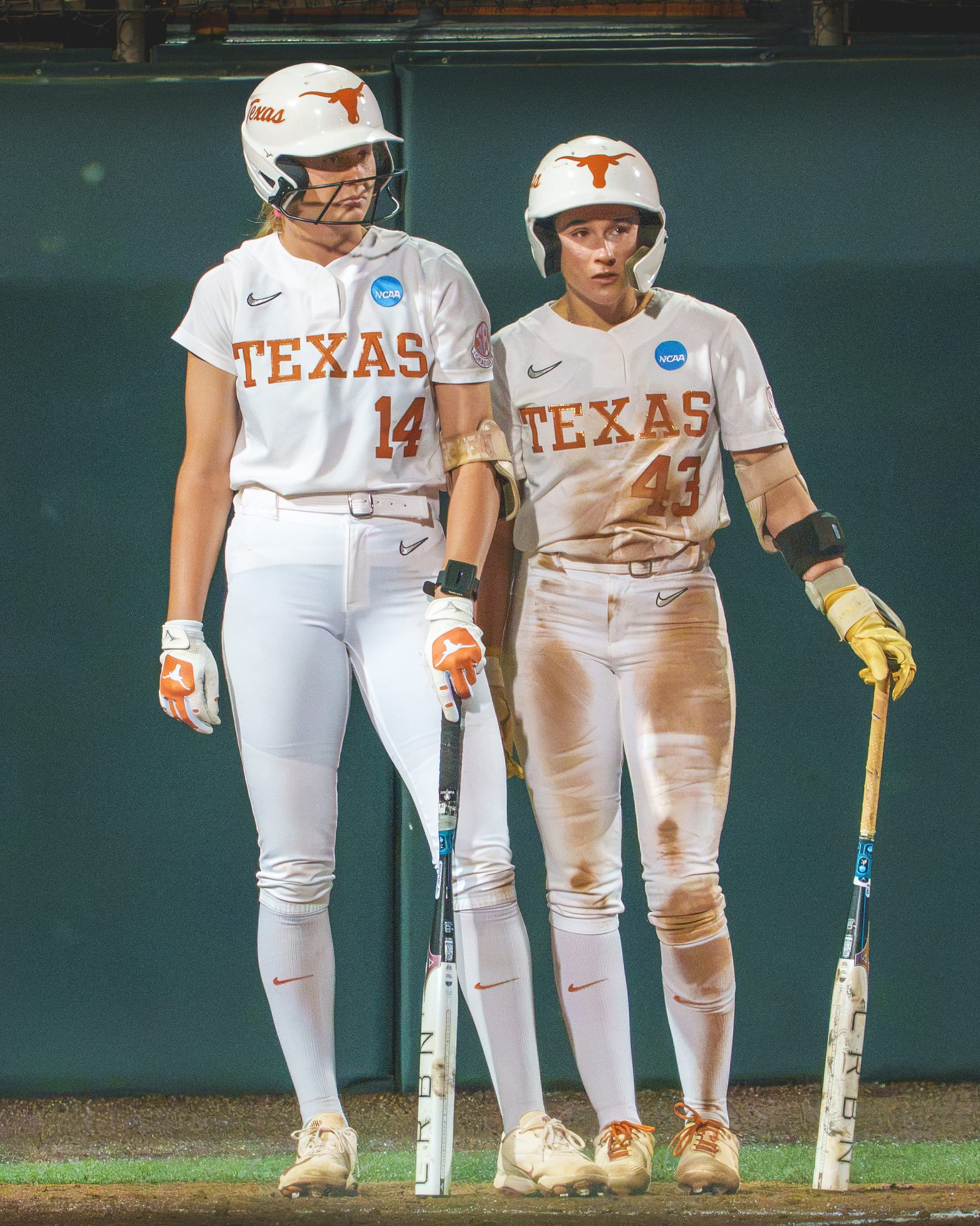 Reese Atwood (14) and Leighann Goode (43) as Texas Longhorns teammates.