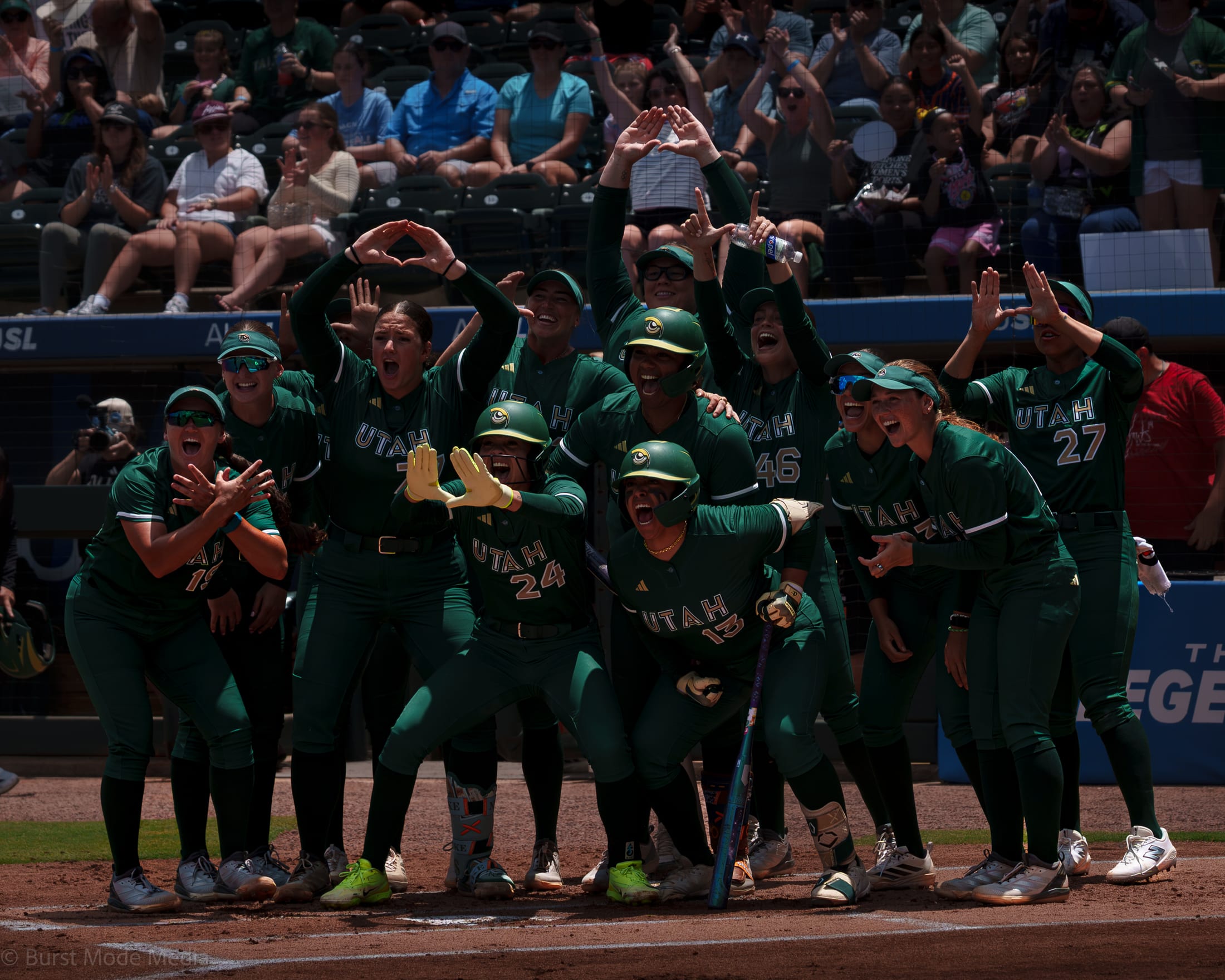 Utah Talons greet Jadelyn Allchin after her two-run homer in the first.