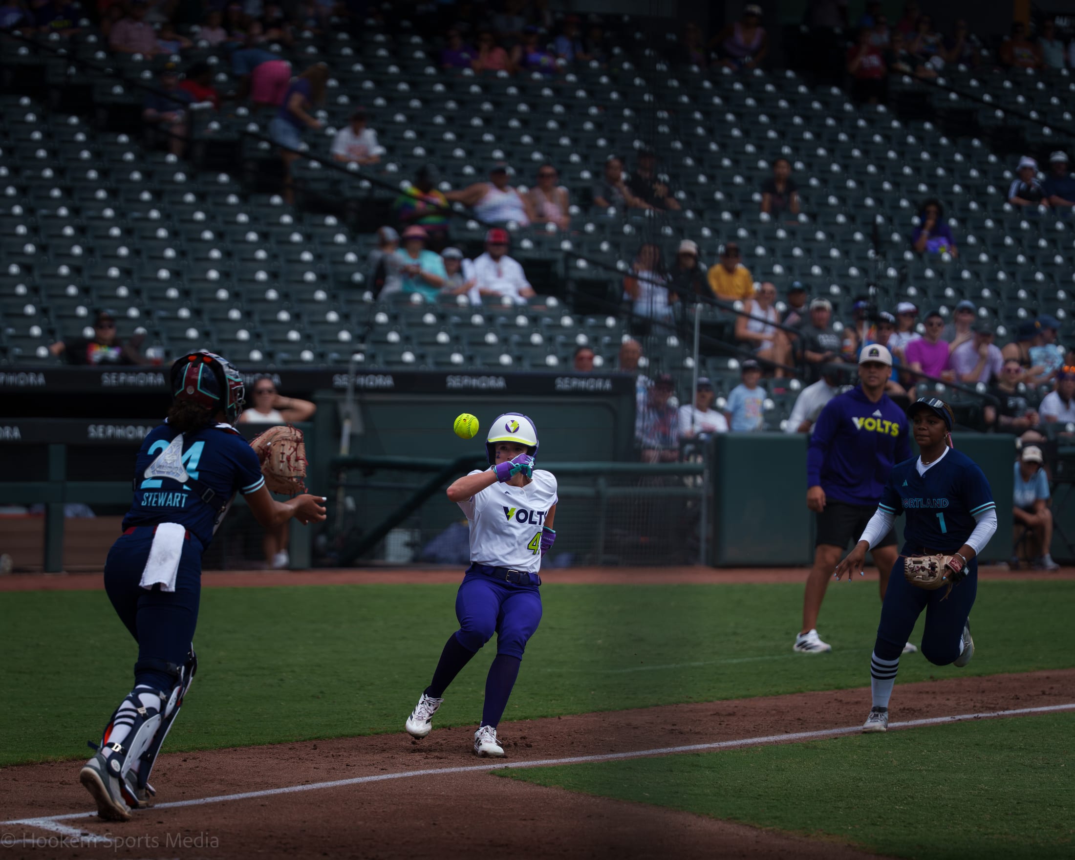 Portland Cascade defense turns a double play against the Texas Volts.