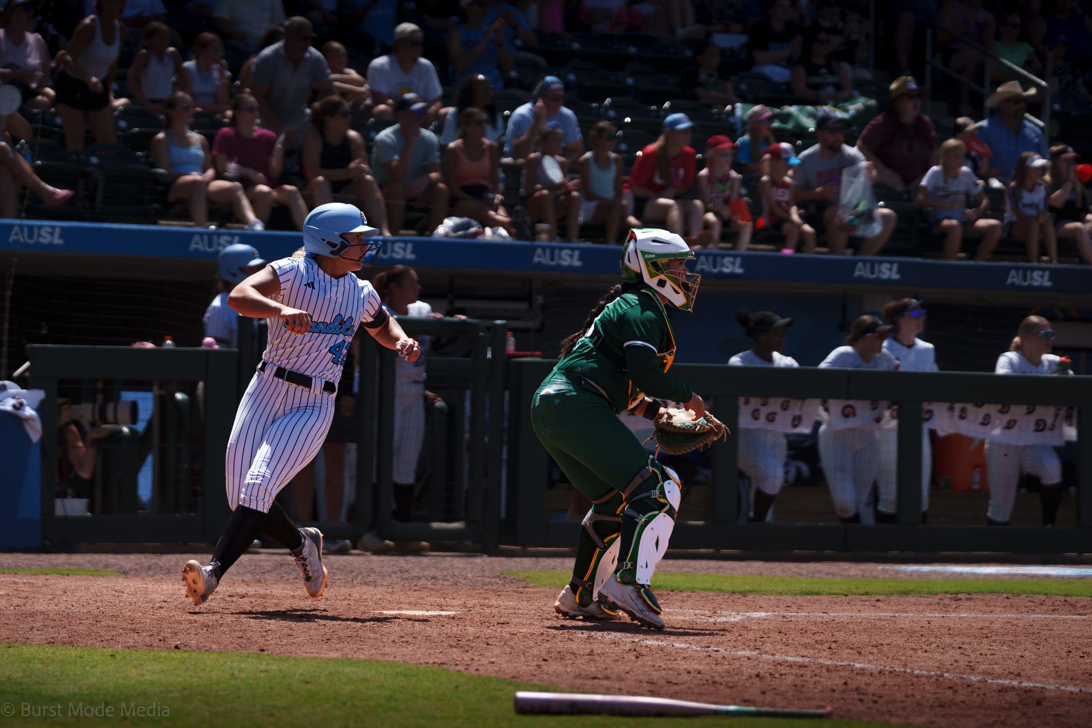 Keirstin Roose races home as Chicago scores in the seventh.