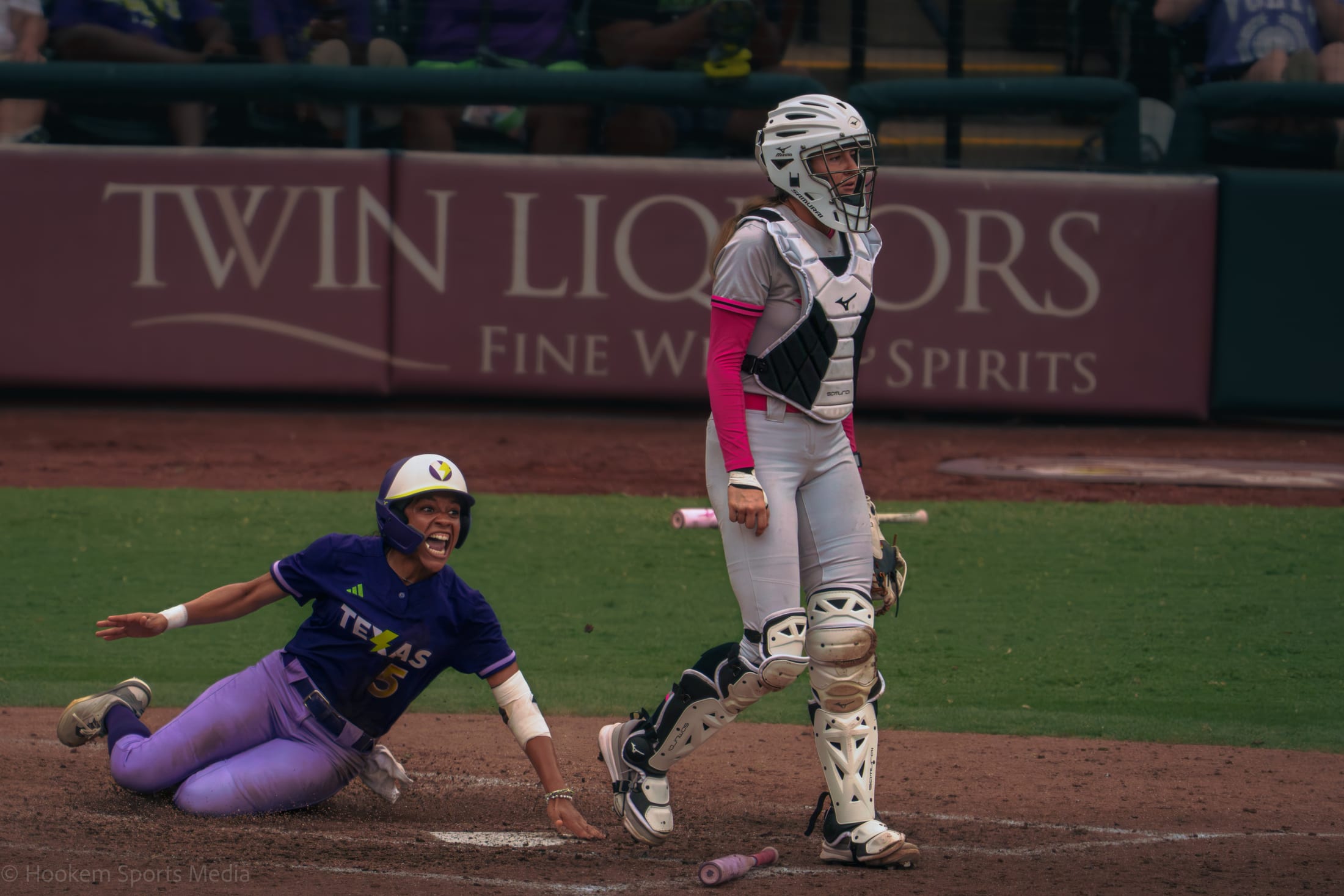 Rylie Boone slides home to score the walk-off run against Carolina.