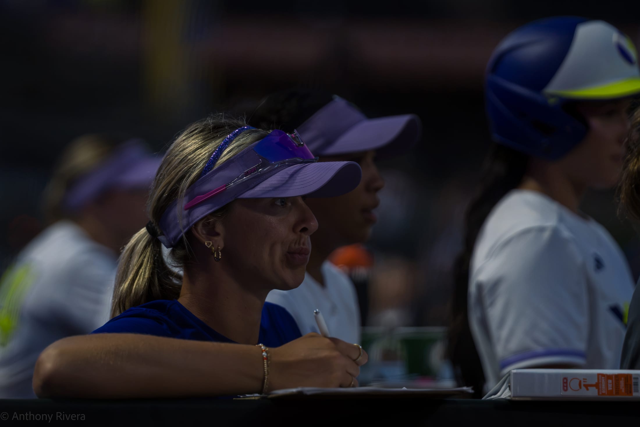 Texas Volts players take note from the dugout.