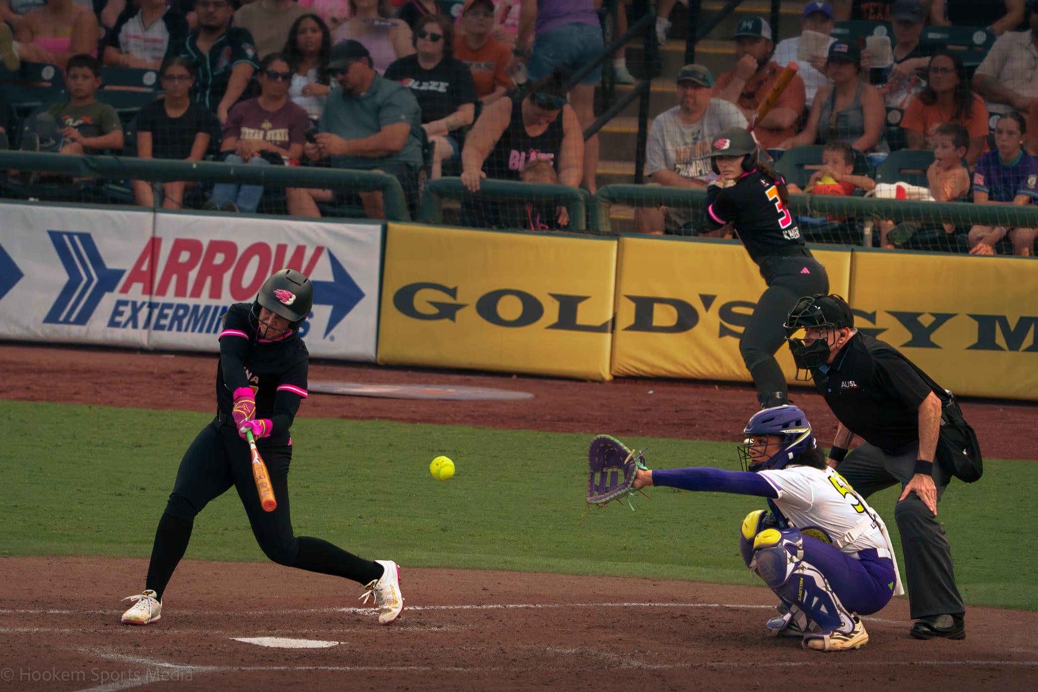 Volts catcher Michaela Edenfield takes an incoming strike against the Blaze.