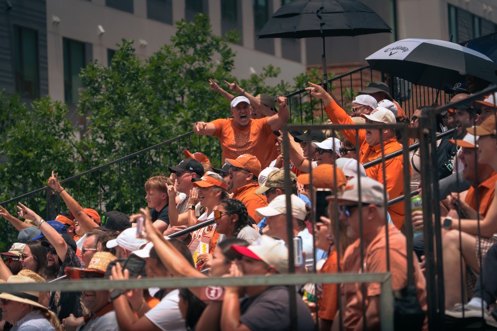 Texas softball fans cheer and Hook 'em from the McCombs Field stands.
